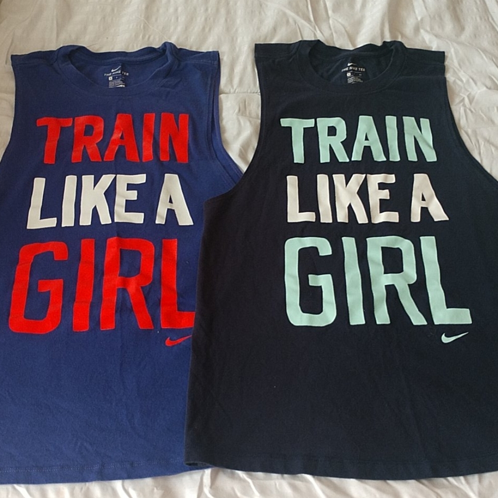 2 Nike muscle tanks